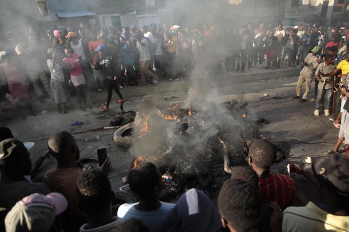 海地黑帮13人遭打死焚尸