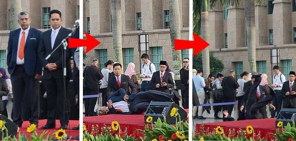 首相马哈迪在首相署常月集会上致词时，一旁的莫哈末哈尼巴（左一）突然昏厥从仪式的讲台摔下，惊吓众人。