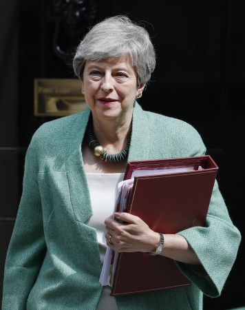英国首相特蕾莎表示离开首相府，对她来说是自豪与失望交杂。（美联社）