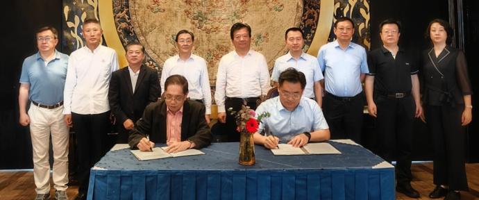 中国东盟商务协会与山东省烟台市商务局签署合作意向书