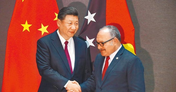 中国国家主席习近平与巴纽总理Peter O’Neill会晤。（美联社）